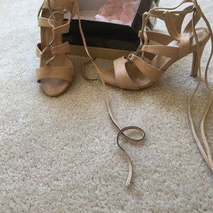 heeled  tan sandals.